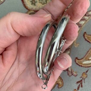 Silver tone hoop earrings